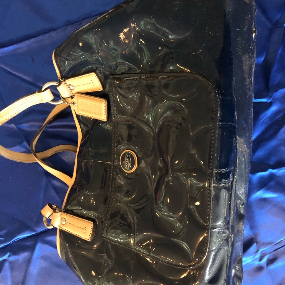 Coach handbag. Blue patent with tan trim.